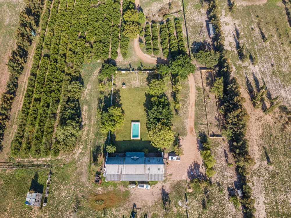 High-angle drone shot providing full property perspective, ideal for Cape Town real estate marketing