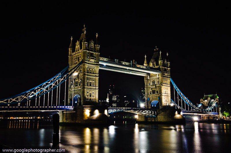 Tower Bridge lit at night in London, iconic location documented in long-exposure travel photography