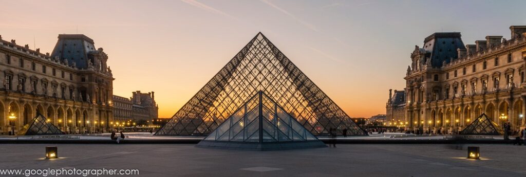 The Louvre Museum at sunset in Paris, captured for editorial travel photography by a Cape Town-based travel photographer