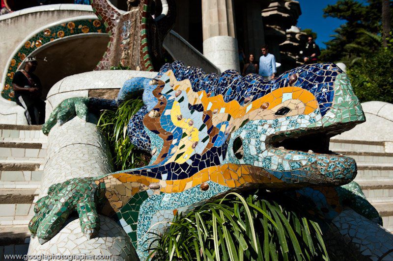 Gaudí's mosaic dragon sculpture at Parc Güell, Barcelona — colourful travel detail shot with cultural significance